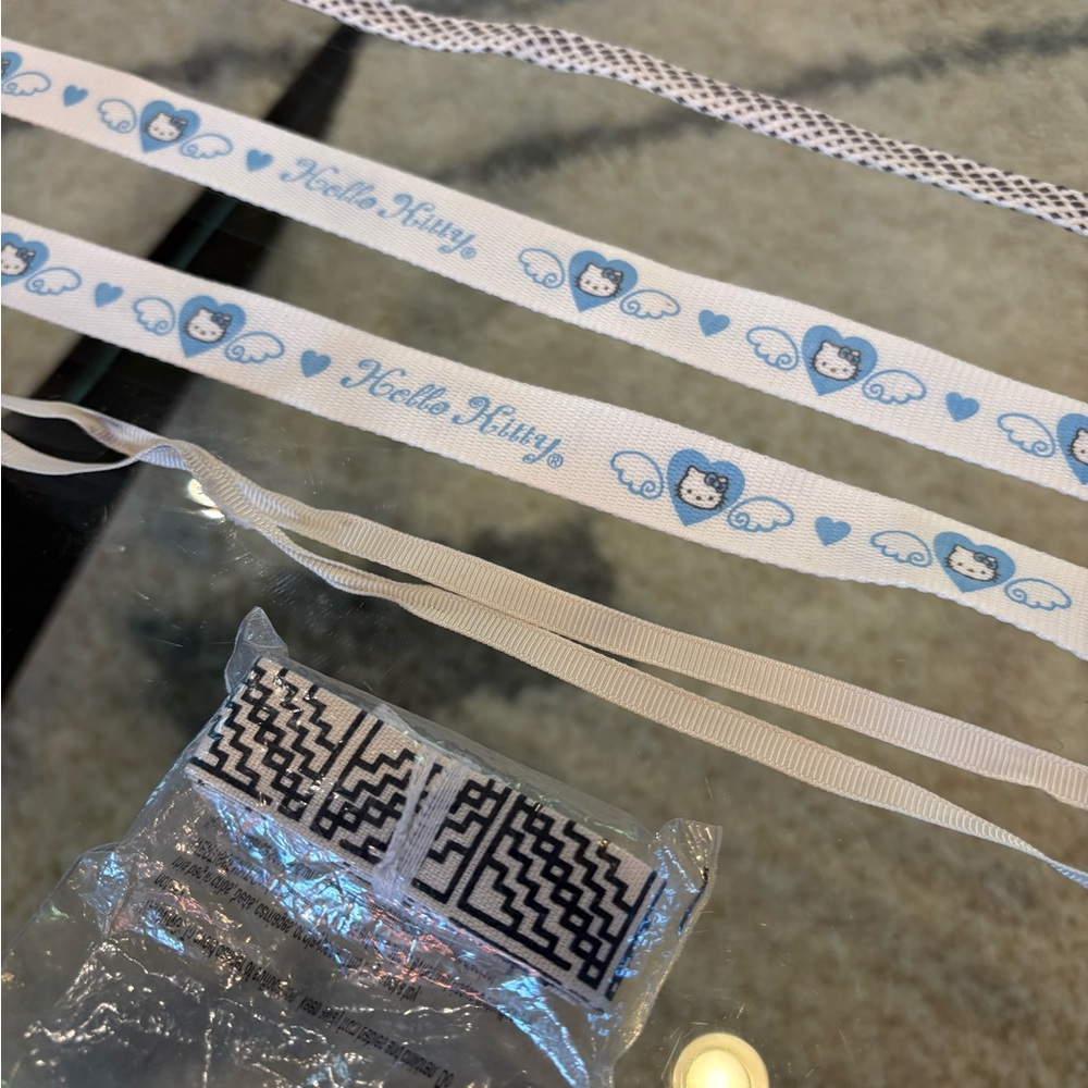 5 sets of shoelaces (one set being Hello Kitty White & Light Blue Winged Heart)